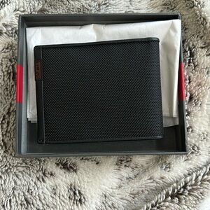 BRAND NEW TUMI WALLET